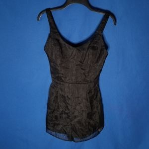 BCBGeneration Black Romper V-neckline A Stylish Cut-Out Back Detail Sleeveless